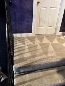 Carpeted stairs showing fresh cleaning lines after service by Louisville's Finest Carpet & Upholstery Care LLC in Louisville, KY
