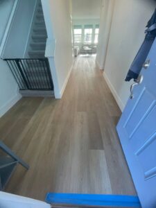 Carpeted stairs leading up from an entryway, installed by Stellar Remodeling in Maggie Valley, NC