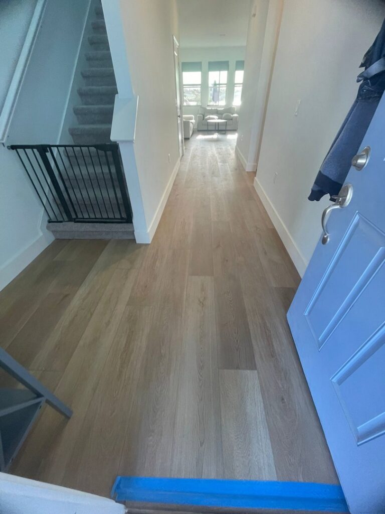Carpeted stairs leading up from an entryway, installed by Stellar Remodeling in Maggie Valley, NC