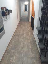 Carpeted stairs next to a hallway, installed by Blue Star Flooring in Euless, TX