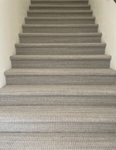 Professionally installed gray carpet on stairs by Bentley Carpet Installation & Sales in Phoenix, AZ