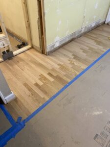 Newly installed light gray carpet on stairs by CHP, Inc. in Chesapeake, VA.