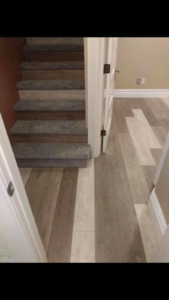 Newly installed carpet on stairs by Fusions Flooring Ltd. in Denver, CO, showcasing quality carpet contracting.