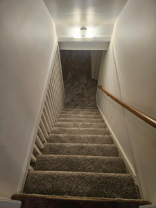 View looking down a newly carpeted staircase installed by Carpets Mostly in Indianapolis, IN
