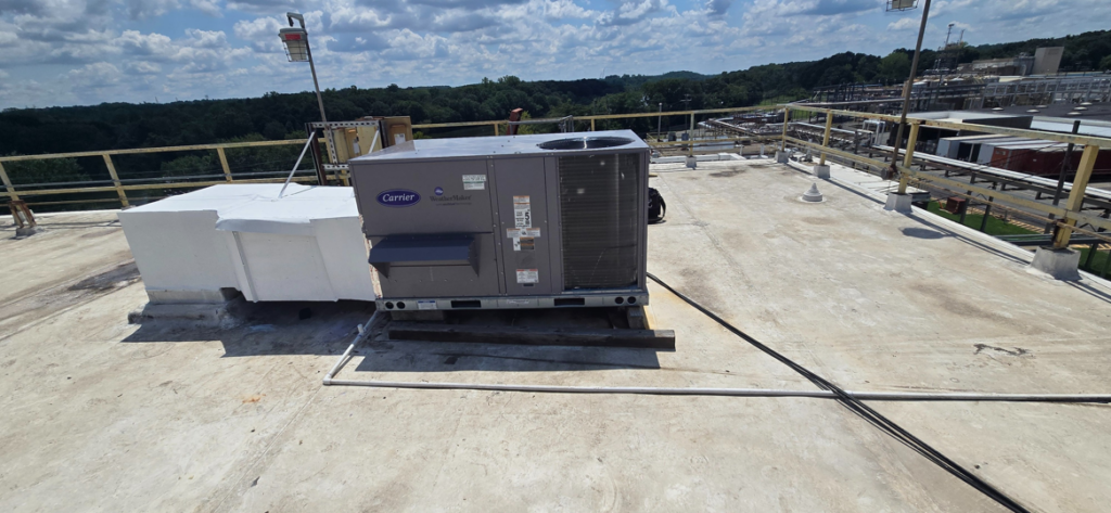 A Carrier commercial rooftop HVAC unit serviced by Seven 2 Seven Mechanical LLC in Concord, NC.