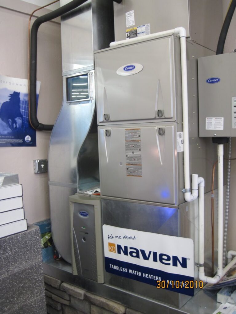 A Carrier furnace or air handler unit display at Alpine Heating & Air Conditioning, Inc. in Idaho Falls, ID.