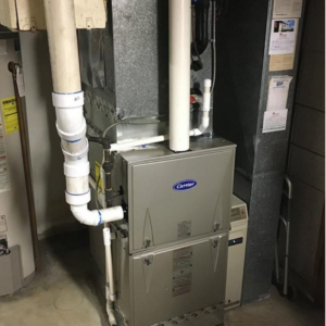 A Carrier furnace and air conditioning system installed by Bakes Heating and Cooling in Chatham, IL.
