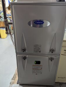 A Carrier Infinity furnace and air handler unit installed by Bloomington Heating & Air in Bloomington, MN.