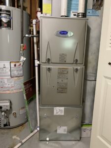 A new Carrier Infinity furnace and air handler unit installed by Reliable Heating & Cooling LLC in Colorado Springs, CO