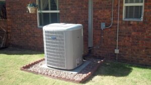 A newly installed Carrier outdoor air conditioning unit by Anderson Refrigeration, Inc. in Poplar Grove, IL.