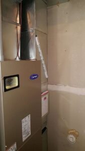 A Carrier residential HVAC system installed by Polar Aire Heating & Cooling in Olathe, KS