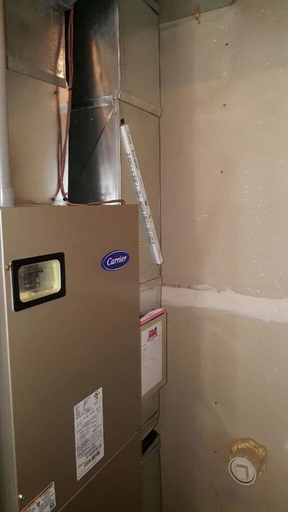 A Carrier residential HVAC system installed by Polar Aire Heating & Cooling in Olathe, KS