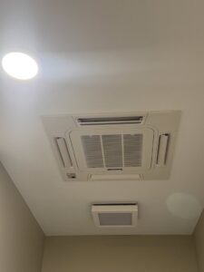 A modern ceiling-mounted HVAC cassette unit installed by Brad Emberton's HVAC in Owensboro, KY.