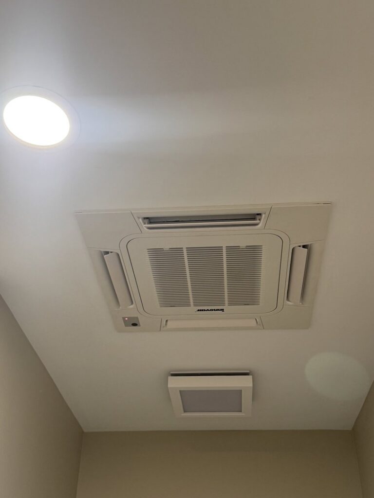A modern ceiling-mounted HVAC cassette unit installed by Brad Emberton's HVAC in Owensboro, KY.