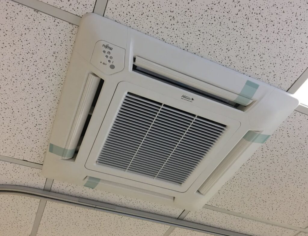 A ceiling cassette mini-split HVAC unit installed by Tom's Heating & Air Conditioning LLC in Lacey Township, NJ.