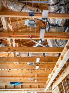 Ceiling electrical rough-in with wiring and junction boxes installed by Powered Solutions in Farmers Branch, TX