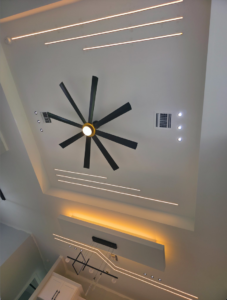 Ceiling with a large modern fan and integrated LED strip lighting installed by NDLIGHT-Smart Home in NW 28th.