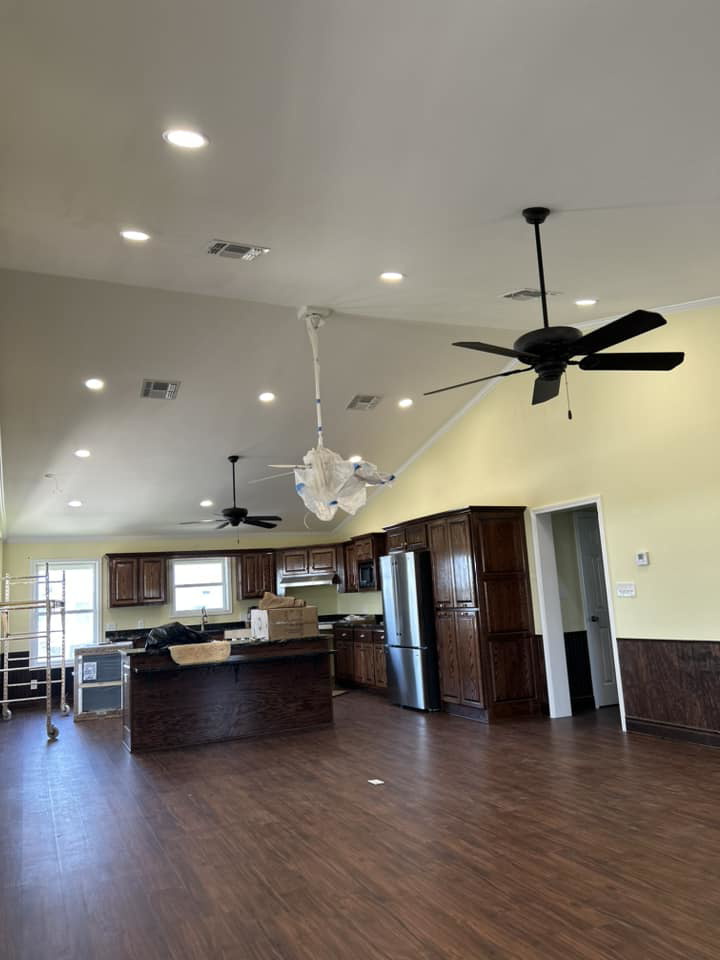 Professional ceiling fan installation in a kitchen and living area by S&S A/C and Electrical LLC in Houma, LA.