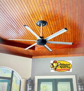 A modern ceiling fan expertly installed on a wooden ceiling by Mister Sparky of Columbia in West Columbia, SC.