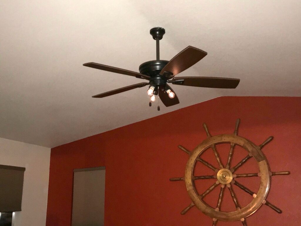 A new ceiling fan installation in a room by Olectric in Reno, NV.