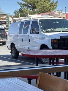 A modern ceiling fan installed in a living room by Top notch electric llc in Clearwater, FL.