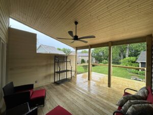 A newly installed ceiling fan on an outdoor patio by Top Tier Electrical Services LLC in Knoxville, TN