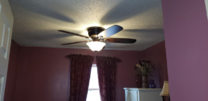 A newly installed or repaired ceiling fan with a light fixture by ZAP Electric LLC in Greeley, CO.
