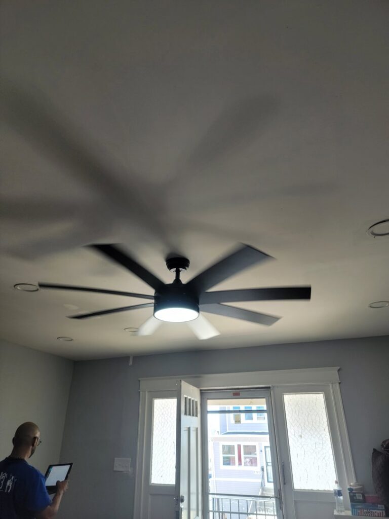 A modern ceiling fan with an integrated light fixture installed by GEN3 Electric & HVAC in Philadelphia, PA.