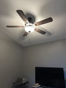 A modern ceiling fan with an integrated light kit installed by Mark Anthony Electric LLC in Wilmington, DE