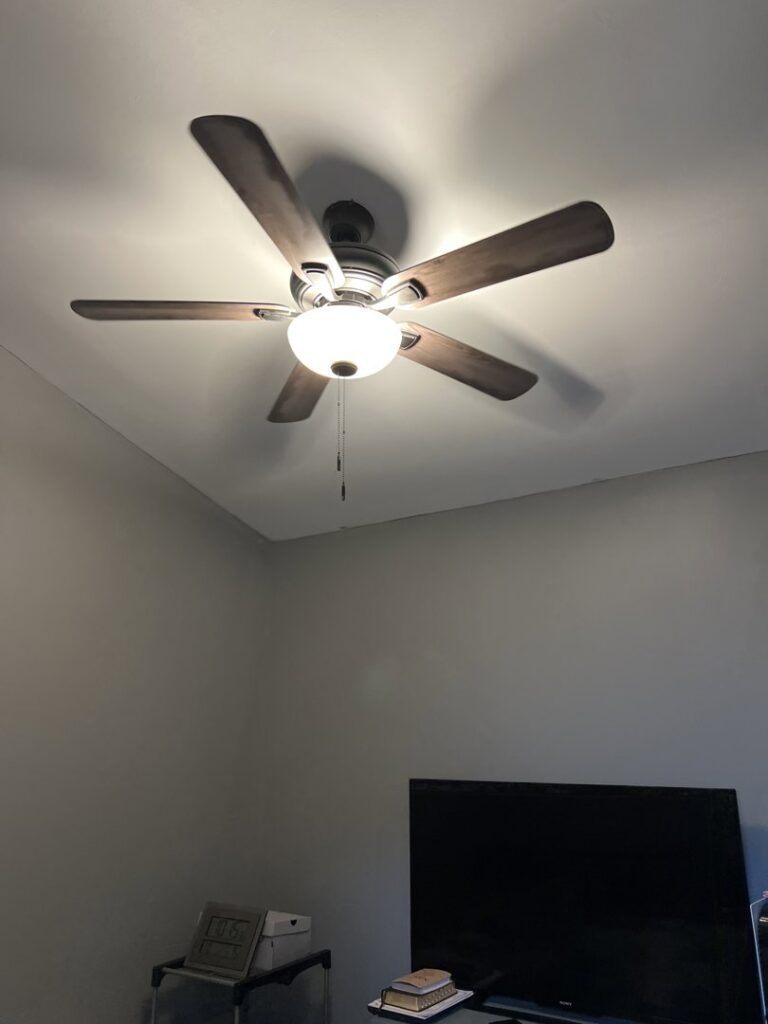 A modern ceiling fan with an integrated light kit installed by Mark Anthony Electric LLC in Wilmington, DE
