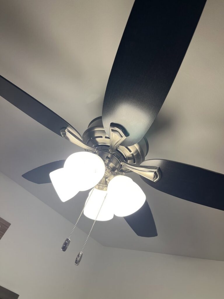 A ceiling fan with multiple light fixtures installed by Mark Anthony Electric LLC in Wilmington, DE