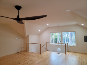 Newly installed ceiling fan and recessed lighting in a room by D&R Construction & Electrical Services in Summerville, SC.