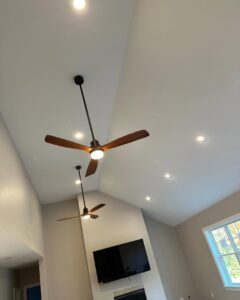 New ceiling fans and recessed lighting installed in a living room by Breakers Electric LLC in Dover, NH.