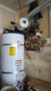 A ceiling-mounted HVAC cassette unit installed by Dynamic Utility Services, Inc. Heating, A/C & Refrigeration in Shoreline, WA.