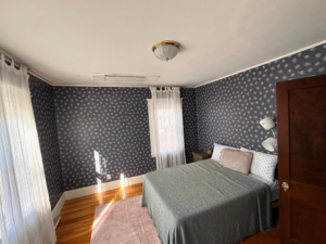 A newly installed ceiling-mounted HVAC unit in a bedroom by ComfortCool Mass in Quincy, MA