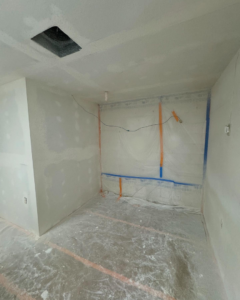 Ceiling HVAC vent opening during construction by AZ Remodeling & Handyman LLC in Scottsdale, AZ