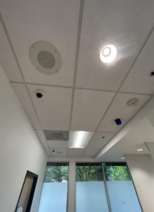 Installed ceiling lights, speaker, and camera in a commercial space by Pacific Sun Electric in Oregon City, OR