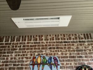 A ceiling-mounted HVAC unit installed by Bob Woodall Air Care Systems on a porch in Dothan, AL.
