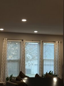 Bright recessed lighting installed in a ceiling by Black Power Redevelopers, serving Papillion, NE.