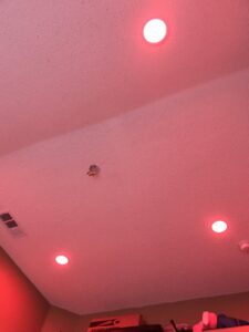 Ceiling with red recessed lighting installed by AVA Electric, LLC in Fort Worth, TX.