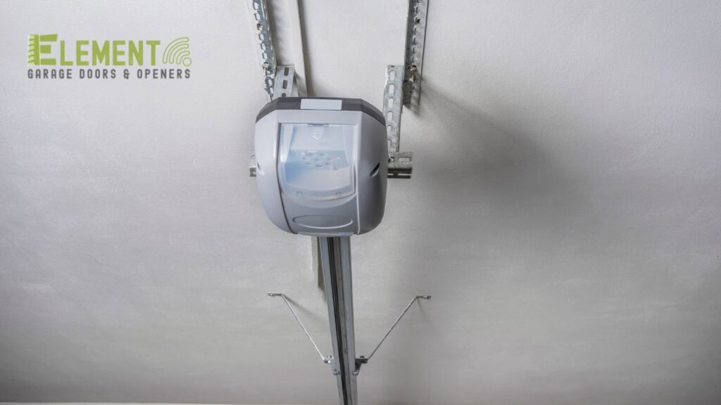 A chain-drive garage door opener system installed overhead, showcasing reliable operation by Element Garage Door Repair Of Portland, OR