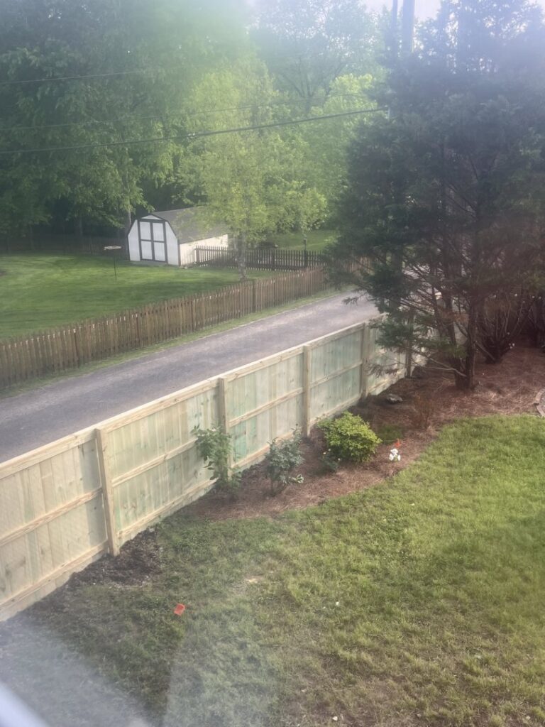 A composite image showing a chain link fence with a wooden gate and a wooden privacy fence by Fenceworks of Middle Tennessee in Nashville, TN.