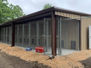 Newly installed chain link dog kennels by AmeriDream Fence & Deck in Joliet, IL.