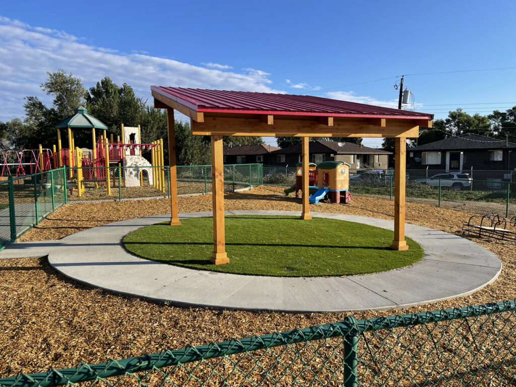 A durable chain-link fence enclosing a playground area, installed by North CO Fence & Deck in Greeley, CO.