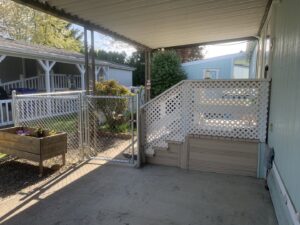 A durable chain link fence with a gate, installed for a residential property by Fence Repair Master in Vancouver, WA.