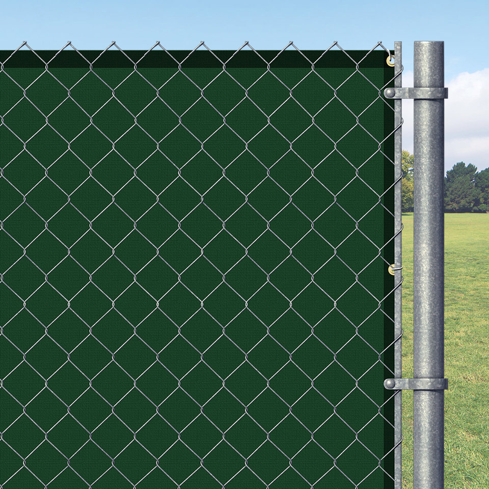 A chain-link fence with a green privacy screen installed by National Construction Rentals in Las Vegas, NV.