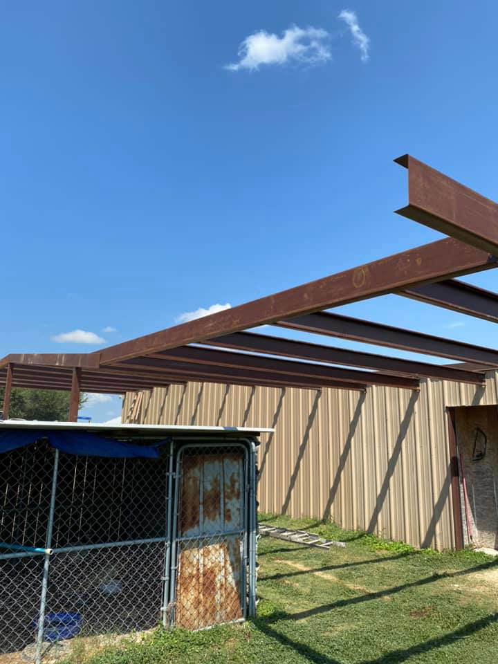 A durable chain-link kennel or animal enclosure built by Triple J Welding and Fabrication in San Antonio, TX.