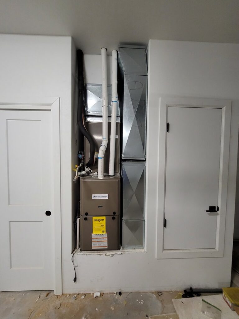 A Champion HVAC system and ductwork installed in a residential setting by After Hours Heating & Air Conditioning LLC in Chesapeake, VA.