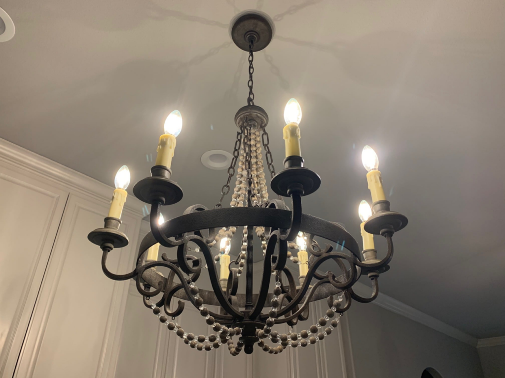 A decorative chandelier with multiple light bulbs installed by Chuck's Electric and Construction in Corpus Christi, TX
