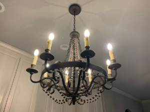 A decorative chandelier with multiple light bulbs installed by Chuck's Electric and Construction in Corpus Christi, TX